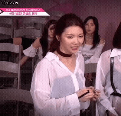 Woman In Choker And White Shirt With Girls GIF