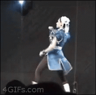 Woman In Chun Li Costume Kicking Leg GIF