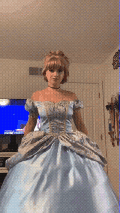 Woman In Cinderella Dress In Front Of TV GIF