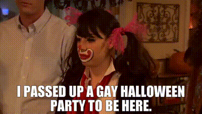 Woman In Clown Costume Talking About Gay Halloween Party GIF