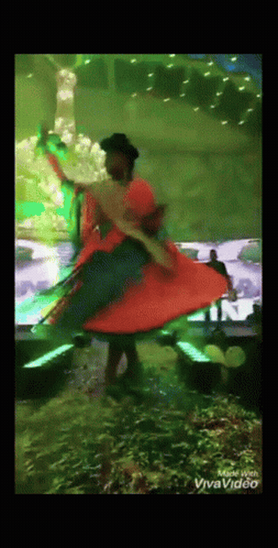 Woman In Colorful Dress Dancing Made With Vivavideo GIF