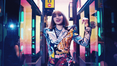 Woman In Colorful Jacket With Iron Maiden GIF