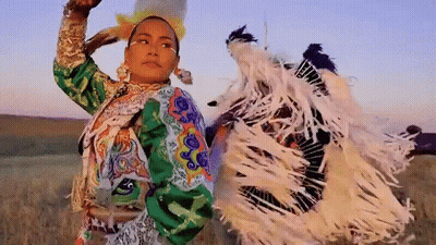 Woman In Colorful Native American Dress Dancing GIF