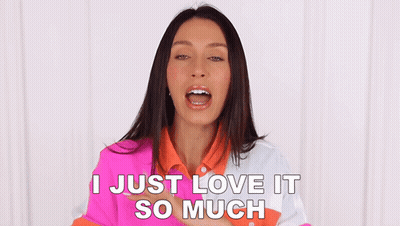 Woman In Colorful Shirt Saying I Love It GIF
