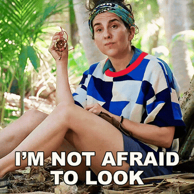 Woman In Colorful Shirt Saying I'm Not Afraid GIF