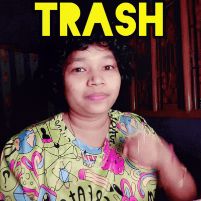Woman In Colorful Shirt Saying Trash GIF