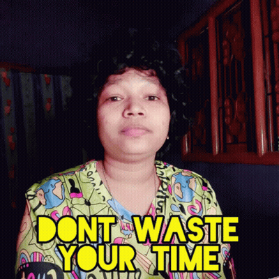 Woman In Colorful Shirt Says Dont Waste Your Time GIF