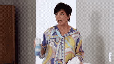 Woman In Colorful Shirt Standing GIF