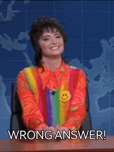 Woman In Colorful Sweater At Desk With Wrong Answer GIF