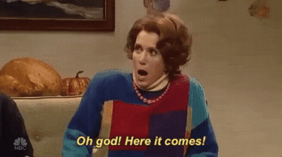 Woman In Colorful Sweater Surprised GIF