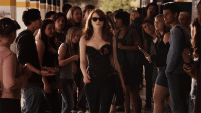 Woman In Corset With Letter A In Front Of Crowd GIF