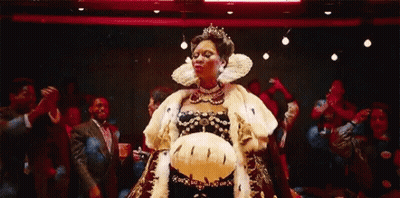 Woman In Costume Dancing In Front Of Crowd GIF