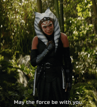 Woman In Costume Saying May The Force Be With You GIF