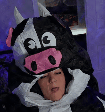 Woman In Cow Costume With Horns GIF