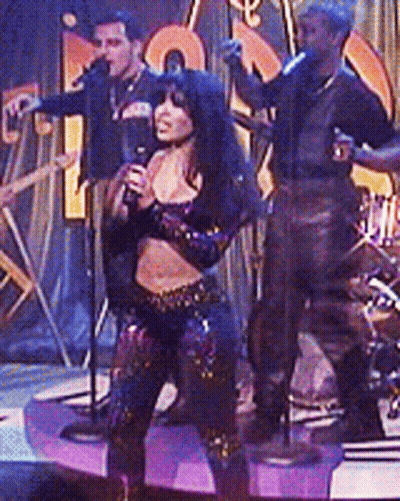 Woman In Cow Print Crop Top Dancing On Stage GIF