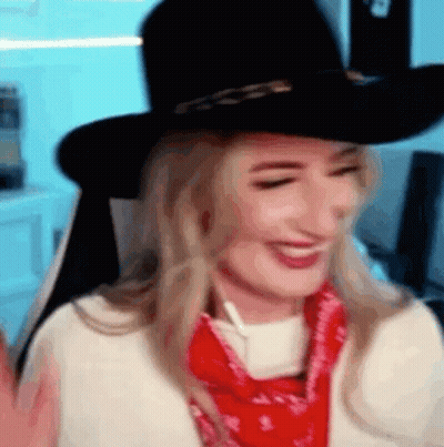 Woman In Cowboy Hat And Red Bandana Smiling GIF