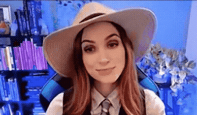 Woman In Cowboy Hat And Tie Smiling GIF