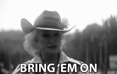Woman In Cowboy Hat Saying Bring Em On GIF