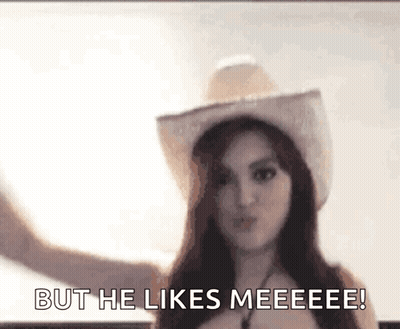 Woman In Cowboy Hat Says But He Likes Meeee GIF