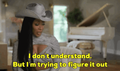 Mujer con sombrero de vaquero dice: No entiendo pero estoy tratando de averiguarlo GIF