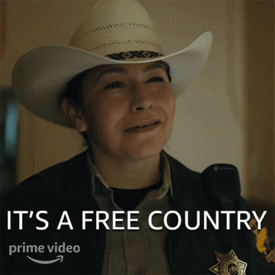 Woman In Cowboy Hat Smiling It's A Free Country GIF