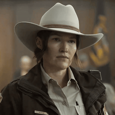 Woman In Cowboy Hat With Kane On Jacket GIF
