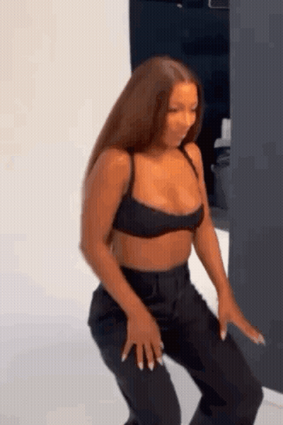 Woman In Crop Top And Black Pants Dancing GIF