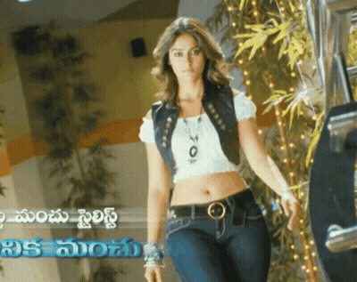 Woman In Crop Top And Jeans Before Telugu Sign GIF
