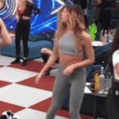 Woman In Crop Top And Leggings GIF