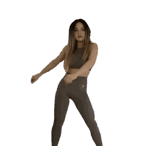 Woman In Crop Top And Leggings With Number 7 Sticker