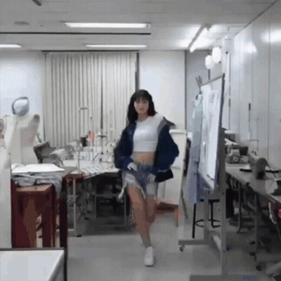 Woman In Crop Top And Shorts Walking GIF
