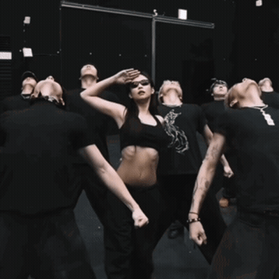 Woman In Crop Top Dancing With Group GIF