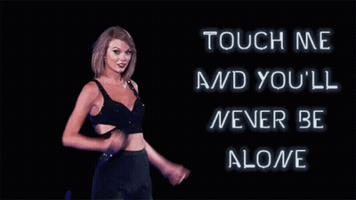 Woman In Crop Top Holding Microphone On Stage GIF
