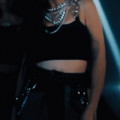 Woman In Crop Top Surrounded By Women GIF