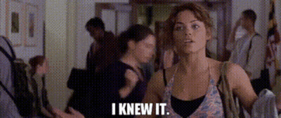 Woman In Crowded Hallway Saying I Knew It GIF