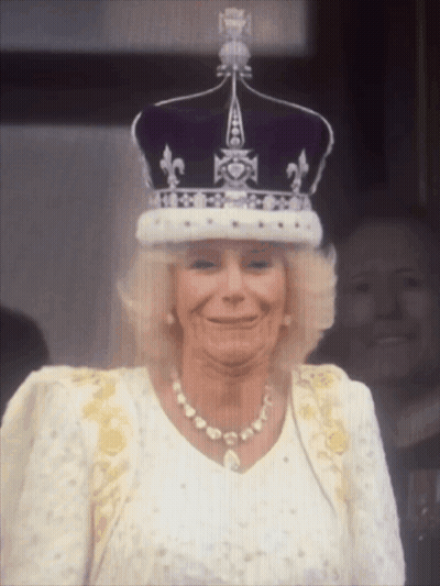 Woman In Crown And Pearls Smiling GIF