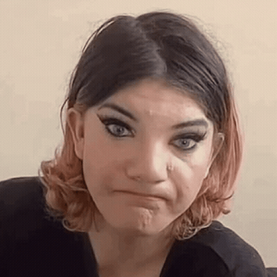 Woman In Crown Holding Wand Before Crowd GIF