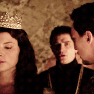 Woman In Crown Standing Next To Man GIF