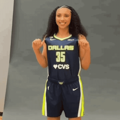 Woman In Dallas 35 CVS Jersey Holding Hands GIF