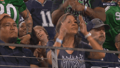 Woman In Dallas Cowboys Shirt Covering Face GIF