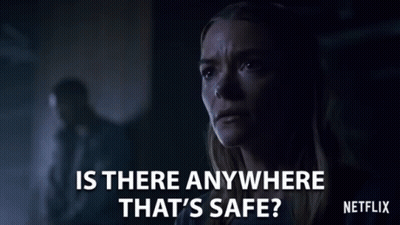 Woman In Dark Room Asking If Anywhere Safe GIF