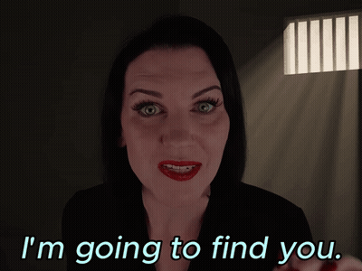 Woman In Dark Room Saying I'm Going To Find You GIF