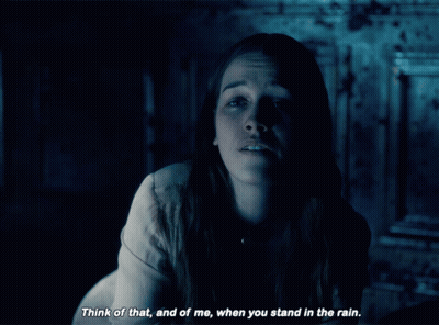 Woman In Dark Room Think Of That And Of Me When You Stand In The Rain GIF