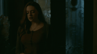 Woman In Dark Room With Tony Solomons GIF