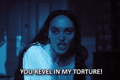 Woman In Dark Room You Revel In My Torture GIF