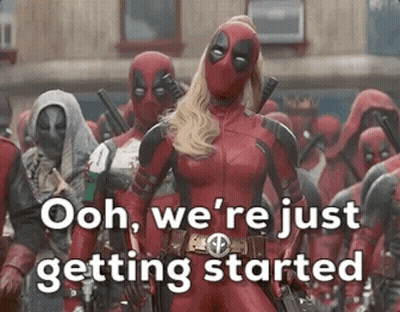 Woman In Deadpool Costume Standing In Crowd Of Deadpools GIF