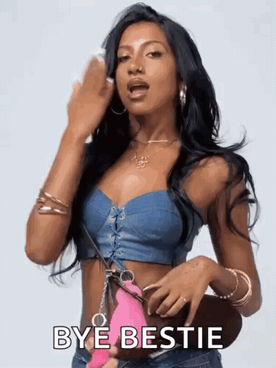 Woman In Denim Crop Top Holding Pink Purse Says Bye Bestie GIF