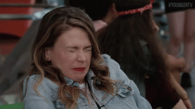 Woman In Denim Jacket Crying GIF