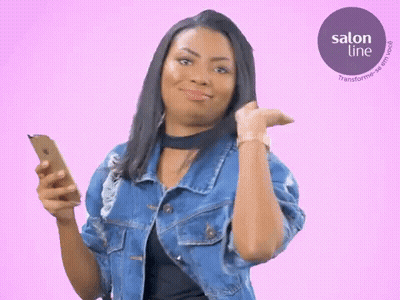 Woman In Denim Jacket Holding Cell Phone And Watch GIF