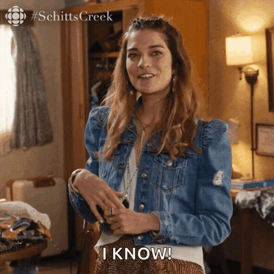 Woman In Denim Jacket Saying I Know GIF